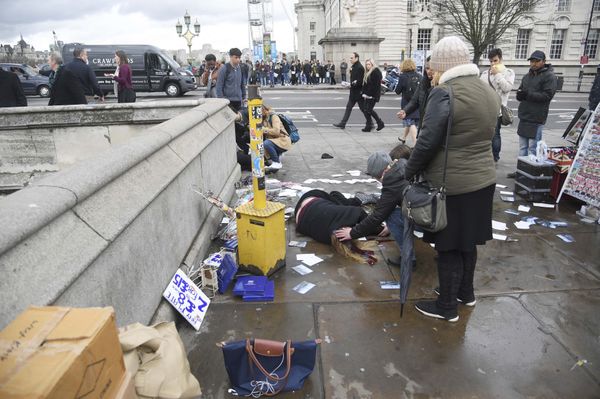Injured people are assisted after an incident on Westminster Bridge in London, Britain. Injured people are assisted after an incident on Westminster Bridge in London, Britain. - Sputnik International