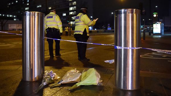 Flowers are laid at the scene after an attack on Westminster Bridge in London, Britain, March 22, 2017. Flowers are laid at the scene after an attack on Westminster Bridge in London, Britain, March 22, 2017. - Sputnik International