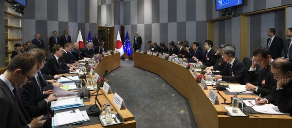 Officials sit as they attend an EU-Japan summit with EU Commission President, European Council and Japan's Prime Minister at the EU Headquarters in Brussels on March 21, 2017. Officials sit as they attend an EU-Japan summit with EU Commission President, European Council and Japan's Prime Minister at the EU Headquarters in Brussels on March 21, 2017. - Sputnik International