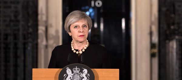 Britain's Prime Minister Theresa May makes a statement at Downing street in London, Britain, March 22, 2017 following the attack in Westminster. - Sputnik International