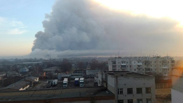 Smoke rises over a warehouse storing tank ammunition at a military base in the town of Balaklia (Balakleya), Kharkiv region, Ukraine - Sputnik International