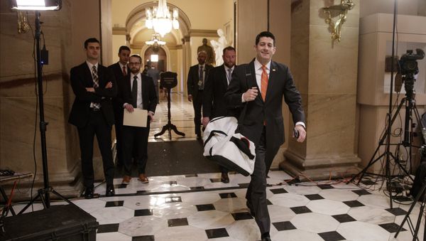 House Speaker Paul Ryan of Wis. strides to his office on Capitol Hill in Washington, Thursday, March 23, 2017, as he and the Republican leadership scramble for votes on their health care overhaul in the face of opposition from reluctant conservatives in the House Freedom Caucus. House Speaker Paul Ryan of Wis. strides to his office on Capitol Hill in Washington, Thursday, March 23, 2017, as he and the Republican leadership scramble for votes on their health care overhaul in the face of opposition from reluctant conservatives in the House Freedom Caucus. - Sputnik International