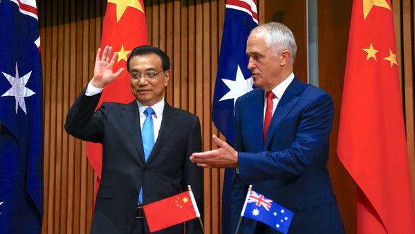 Australia's Prime Minister Malcolm Turnbull gestures to Chinese Premier Li Keqiang at the end of an official signing ceremony at Parliament House in Canberra, Australia, March 24, 2017 Australia's Prime Minister Malcolm Turnbull gestures to Chinese Premier Li Keqiang at the end of an official signing ceremony at Parliament House in Canberra, Australia, March 24, 2017 - Sputnik International
