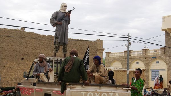 Fighters from the al-Qaida-linked Islamist group stand guard in Timbuktu, Mali (File) Fighters from the al-Qaida-linked Islamist group stand guard in Timbuktu, Mali (File) - Sputnik International