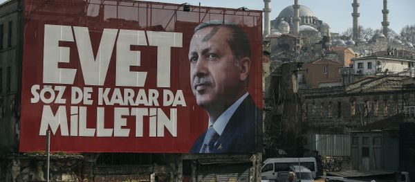 A poster of Turkey's President Recep Tayyip Erdogan for the upcoming referendum is seen backdropped by the Suleymaniye Mosque in Istanbul, Friday, March 24, 2017 - Sputnik International