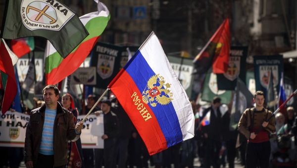 This picture taken on March 3, 2017, shows a man marching with a Russian flag during a political rally on Bulgaria's National Day in central Sofia This picture taken on March 3, 2017, shows a man marching with a Russian flag during a political rally on Bulgaria's National Day in central Sofia - Sputnik International
