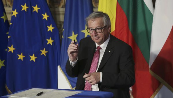 European Commission President Jean-Claude Juncker holds up a pen after signing document during the EU leaders meeting on the 60th anniversary of the Treaty of Rome, in Rome, Italy March 25, 2017 European Commission President Jean-Claude Juncker holds up a pen after signing document during the EU leaders meeting on the 60th anniversary of the Treaty of Rome, in Rome, Italy March 25, 2017 - Sputnik International