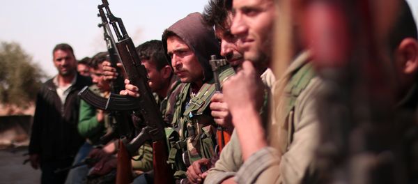 Syrian Democratic Forces(SDF) fighters stand with their weapons north of Raqqa city, Syria March 8, 2017 Syrian Democratic Forces(SDF) fighters stand with their weapons north of Raqqa city, Syria March 8, 2017 - Sputnik International