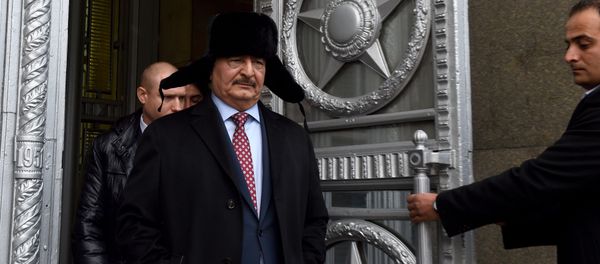 Marshal Khalifa Haftar, chief of the so-called Libyan National Army, leaves the main building of Russia's Foreign Ministry after a meeting with Russian Minister of Foreign Affairs in Moscow on November 29, 2016 - Sputnik International