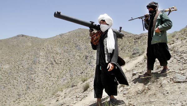 May 27, 2016 photo, members of a breakaway faction of the Taliban fighters walk during a gathering, in Shindand district of Herat province, Afghanistan - Sputnik International