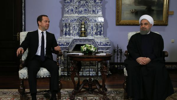 March 27, 2017. Russian Prime Minister Dmitry Medvedev meets with President of Iran Hassan Rouhani, right, on his official visit to Russia March 27, 2017. Russian Prime Minister Dmitry Medvedev meets with President of Iran Hassan Rouhani, right, on his official visit to Russia - Sputnik International