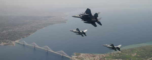 In this photo released by the Hellenic Air Force, two Greek F-16 fighter jets and a USAF F-15E Strike Eagles, based at Lakenheath airbase in England, fly past the 2,880-meter Rio-Antirrio Bridge in southern Greece, on Wednesday, April 13, 2016. The U.S. jets took part in Exercise Iniohos 2016, in southern Greece, together with military aircraft from Greece and Israel. In this photo released by the Hellenic Air Force, two Greek F-16 fighter jets and a USAF F-15E Strike Eagles, based at Lakenheath airbase in England, fly past the 2,880-meter Rio-Antirrio Bridge in southern Greece, on Wednesday, April 13, 2016. The U.S. jets took part in Exercise Iniohos 2016, in southern Greece, together with military aircraft from Greece and Israel. - Sputnik International