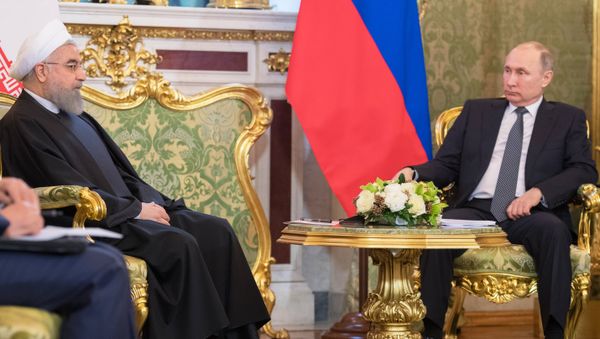 March 28, 2017. Russian President Vladimir Putin and President of the Islamic Republic of Iran Hassan Rouhani, left, during a meeting. March 28, 2017. Russian President Vladimir Putin and President of the Islamic Republic of Iran Hassan Rouhani, left, during a meeting. - Sputnik International