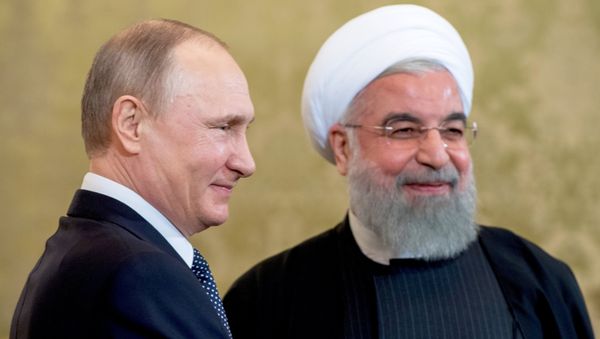 March 28, 2017. Russian President Vladimir Putin and President of the Islamic Republic of Iran Hassan Rouhani, left, during a meeting. March 28, 2017. Russian President Vladimir Putin and President of the Islamic Republic of Iran Hassan Rouhani, left, during a meeting. - Sputnik International