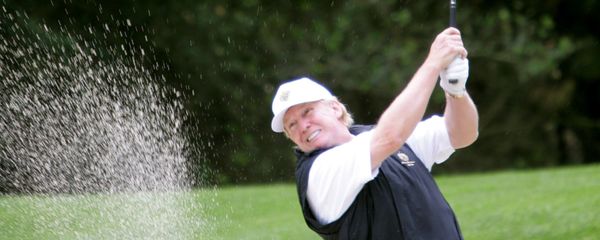 Donald Trump hits out of the sand on the first hole of the Poppy Hills Golf Course Donald Trump hits out of the sand on the first hole of the Poppy Hills Golf Course - Sputnik International