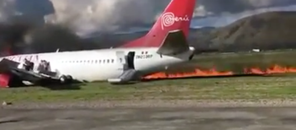 Peruvian Airlines reports all passengers aboard its jet that caught fire at Jauia airport are safe. - Sputnik International