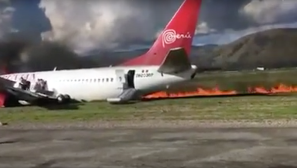 Peruvian Airlines reports all passengers aboard its jet that caught fire at Jauia airport are safe. Peruvian Airlines reports all passengers aboard its jet that caught fire at Jauia airport are safe. - Sputnik International