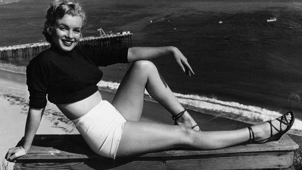 Marilyn Monroe has held a variety of jobs, from making five cents a week in an Orphan home to a stock contract at a studio. She clicked as the sexy girl in Asphalt Jungle, and the roles got better. She has been named to Miss Cheesecake of 1951 by stars and stripes, a service paper. (04/17/1951) - Sputnik International