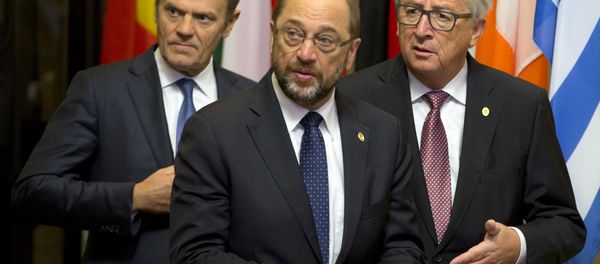 European Council President Donald Tusk, left, walks with European Parliament President Martin Schulz, center, and European Commission President Jean-Claude Juncker prior to an EU-Ukraine summit at the European Council building in Brussels on Thursday, Nov. 24, 2016. European Council President Donald Tusk, left, walks with European Parliament President Martin Schulz, center, and European Commission President Jean-Claude Juncker prior to an EU-Ukraine summit at the European Council building in Brussels on Thursday, Nov. 24, 2016. - Sputnik International