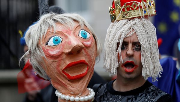 A protester holds an effigy of Britain's Prime Minister Theresa May during an anti-Brexit demonstration after Britain's Prime Minister Theresa May triggered the process by which the United Kingdom will leave the European Union, in London, Britain March 29, 2017. - Sputnik International
