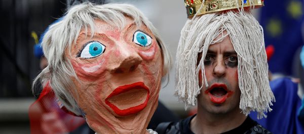 A protester holds an effigy of Britain's Prime Minister Theresa May during an anti-Brexit demonstration after Britain's Prime Minister Theresa May triggered the process by which the United Kingdom will leave the European Union, in London, Britain March 29, 2017. A protester holds an effigy of Britain's Prime Minister Theresa May during an anti-Brexit demonstration after Britain's Prime Minister Theresa May triggered the process by which the United Kingdom will leave the European Union, in London, Britain March 29, 2017. - Sputnik International