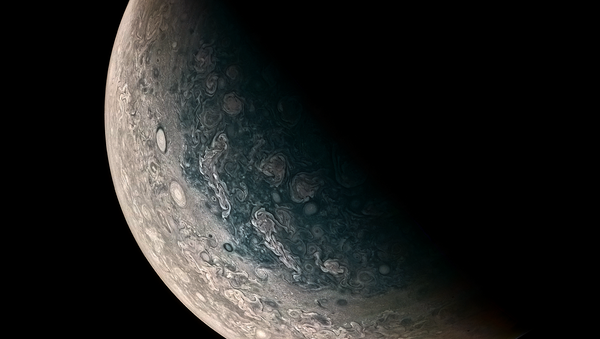 This Jupiter photo is courtesy of Juno, and clearly shows monstrous swirling storms on the planet's surface. This Jupiter photo is courtesy of Juno, and clearly shows monstrous swirling storms on the planet's surface. - Sputnik International