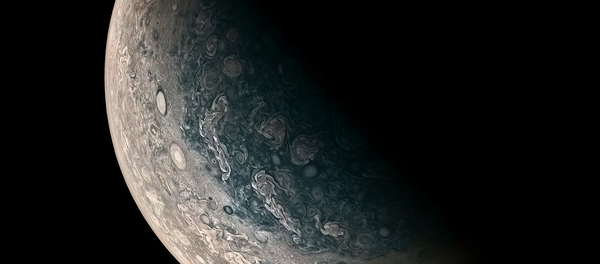 This Jupiter photo is courtesy of Juno, and clearly shows monstrous swirling storms on the planet's surface. This Jupiter photo is courtesy of Juno, and clearly shows monstrous swirling storms on the planet's surface. - Sputnik International