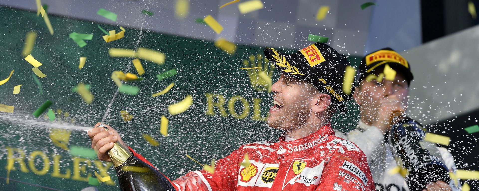 Немецкий пилот Ferrari Себастьян Феттель празднует победу в Гран-при Австралии в Мельбурне - Sputnik International, 1920, 28.07.2022