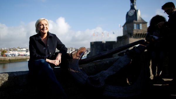 Marine Le Pen, French National Front (FN) political party leader and candidate for French 2017 presidential election pauses during a visit to a market in Concarneau, France, March 31, 2017 Marine Le Pen, French National Front (FN) political party leader and candidate for French 2017 presidential election pauses during a visit to a market in Concarneau, France, March 31, 2017 - Sputnik International