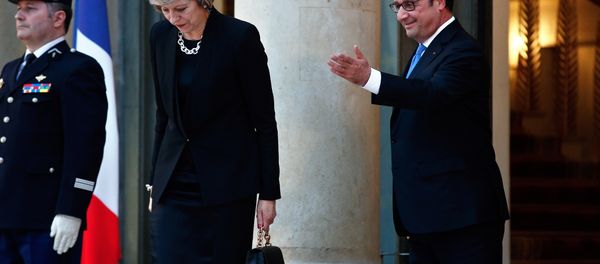 France's President Francois Hollande gestures as Britain's Prime Minister Theresa May leaves the Elysee Palace, in Paris, Thursday, July 21, 2016. France's President Francois Hollande gestures as Britain's Prime Minister Theresa May leaves the Elysee Palace, in Paris, Thursday, July 21, 2016. - Sputnik International