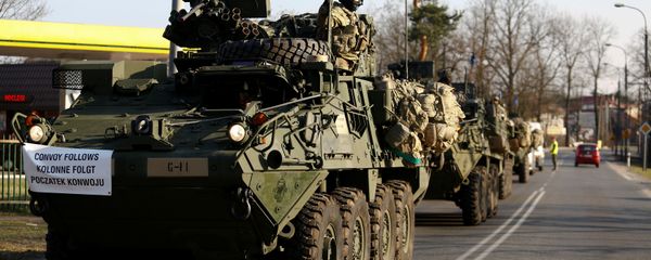 A convoy of U.S. troops, a part of NATO's reinforcement of its eastern flank, who are on their way from Germany to Orzysz in northeast Poland, drive through Sulejowek towards a military base in Wesola, near Warsaw, Poland, March 28, 2017 A convoy of U.S. troops, a part of NATO's reinforcement of its eastern flank, who are on their way from Germany to Orzysz in northeast Poland, drive through Sulejowek towards a military base in Wesola, near Warsaw, Poland, March 28, 2017 - Sputnik International