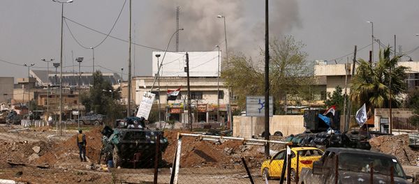 Smoke rises from the old city during a battle against Islamic State militants, in Mosul, Iraq, March 29, 2017 - Sputnik International