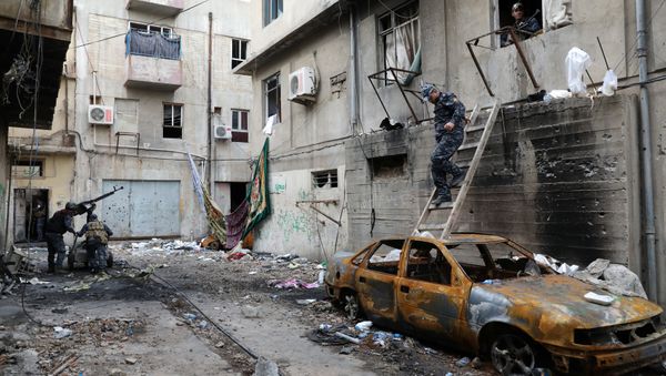 An Iraqi Federal Police member descends a ladder in a street controlled by Iraqi forces during combats between Iraqi forces and Islamic State in Mosul, Iraq, April 1, 2017 An Iraqi Federal Police member descends a ladder in a street controlled by Iraqi forces during combats between Iraqi forces and Islamic State in Mosul, Iraq, April 1, 2017 - Sputnik International