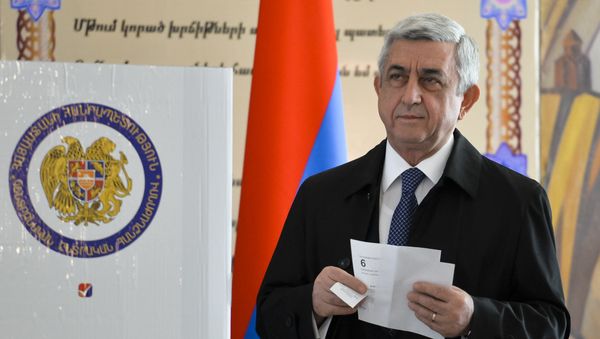 Armenia's President Serzh Sargsyan prepares to casts his ballot at a polling station during a parliamentary election in Yerevan, Armenia, Sunday, April 2, 2017 - Sputnik International