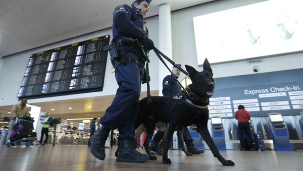 Policemen patrol in the Zaventem airport prior to a ceremony commemorating the first anniversary of twin attacks at Brussels airport and a metro train in Brussels, Belgium, March 22, 2017. - Sputnik International