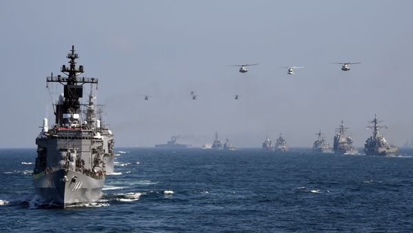 Japan's Maritime Self-Defense Force (MSDF) escort ship Kurama (L) takes part in a fleet review off Sagami Bay, Kanagawa prefecture (File) Japan's Maritime Self-Defense Force (MSDF) escort ship Kurama (L) takes part in a fleet review off Sagami Bay, Kanagawa prefecture (File) - Sputnik International
