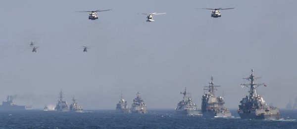 Japan's Maritime Self-Defense Force (MSDF) escort ship Kurama (L) takes part in a fleet review off Sagami Bay, Kanagawa prefecture (File) Japan's Maritime Self-Defense Force (MSDF) escort ship Kurama (L) takes part in a fleet review off Sagami Bay, Kanagawa prefecture (File) - Sputnik International