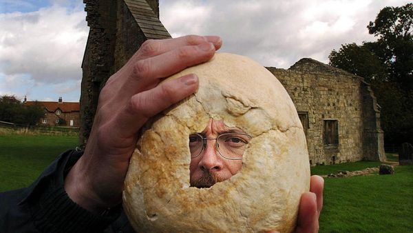 Simon Mays, the Skeletal Biologist at English Heritage's Centre for Archaeology, examines the hole in the skull, Tuesday Oct. 5, 2004, discovered at Wharram Percy, a deserted medieval village near Leeds, England - Sputnik International