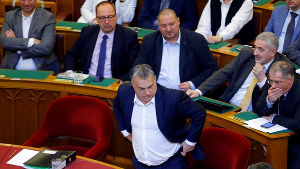 Hungarian Prime Minister Viktor Orban arrives to a vote on a bill tightening regulations on foreign universities operating in Hungary. - Sputnik International