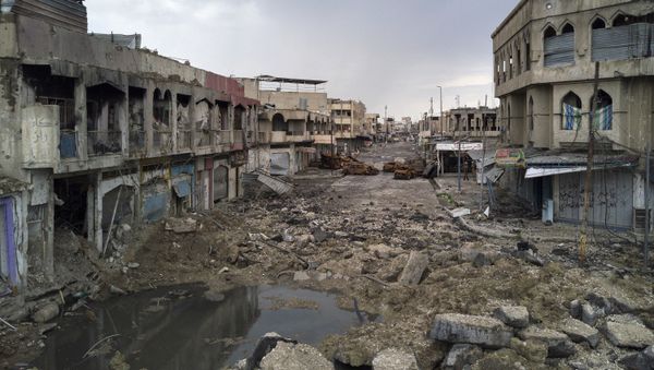 A neighborhood recently retaken by Iraqi security forces during fighting against Islamic State militants on the western side of Mosul, Iraq, Monday, April 3, 2017 A neighborhood recently retaken by Iraqi security forces during fighting against Islamic State militants on the western side of Mosul, Iraq, Monday, April 3, 2017 - Sputnik International