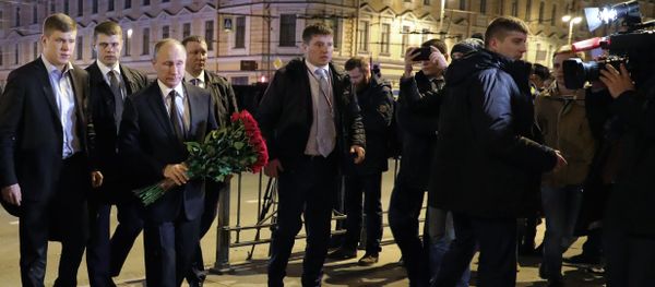 Russian President Vladimir Putin is seen here outside Tekhnologichesky Institute metro station in St. Petersburg where he laid flowers in memory of the victims of the metro train blast Russian President Vladimir Putin is seen here outside Tekhnologichesky Institute metro station in St. Petersburg where he laid flowers in memory of the victims of the metro train blast - Sputnik International