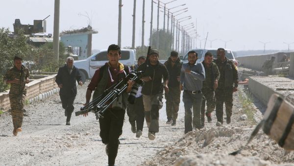 Engineers, journalists and Syrian Democratic Forces (SDF) fighters run for cover after Islamic State shelled positions held by the SDF at the Tabqa Dam on the Euphrates River, Syria - Sputnik International