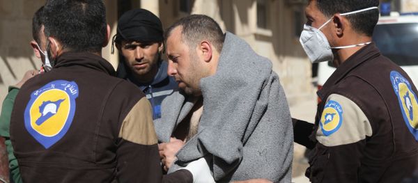 A Syrian man is taken by civil defence workers to a small hospital in the town of Maaret al-Noman following a suspected toxic gas attack in Khan Sheikhun, a nearby rebel-held town in Syria’s northwestern Idlib province A Syrian man is taken by civil defence workers to a small hospital in the town of Maaret al-Noman following a suspected toxic gas attack in Khan Sheikhun, a nearby rebel-held town in Syria’s northwestern Idlib province - Sputnik International