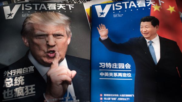 Magazines featuring front pages of US President Donald Trump (L) and China's President Xi Jinping (R) are displayed at a news stand in Beijing Magazines featuring front pages of US President Donald Trump (L) and China's President Xi Jinping (R) are displayed at a news stand in Beijing - Sputnik International