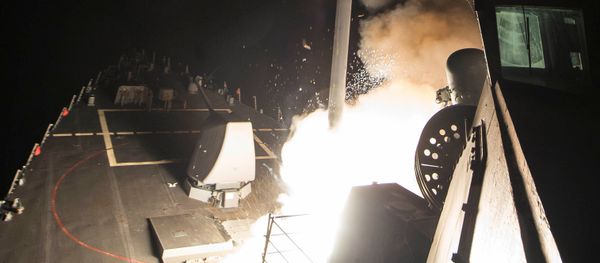 Navy guided-missile destroyer USS Ross (DDG 71) fires a tomahawk land attack missile in Mediterranean Sea which U.S. Defense Department said was a part of cruise missile strike against Syria on April 7, 2017. Navy guided-missile destroyer USS Ross (DDG 71) fires a tomahawk land attack missile in Mediterranean Sea which U.S. Defense Department said was a part of cruise missile strike against Syria on April 7, 2017. - Sputnik International