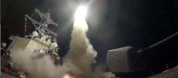 In this image from video provided by the U.S. Navy, the guided-missile destroyer USS Porter (DDG 78) launches a tomahawk land attack missile in the Mediterranean Sea, Friday, April 7, 2017. - Sputnik International
