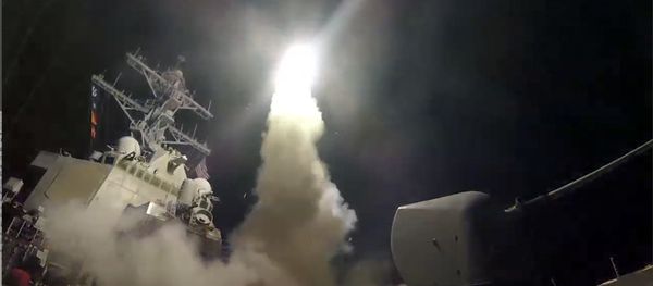 In this image from video provided by the U.S. Navy, the guided-missile destroyer USS Porter (DDG 78) launches a tomahawk land attack missile in the Mediterranean Sea, Friday, April 7, 2017. - Sputnik International