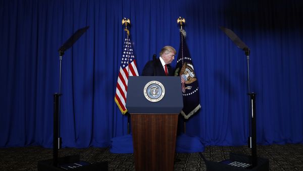 President Donald Trump walks from the podium after speaking at Mar-a-Lago in Palm Beach, Fla., Thursday, April 6, 2017, after the U.S. fired a barrage of cruise missiles into Syria Thursday night President Donald Trump walks from the podium after speaking at Mar-a-Lago in Palm Beach, Fla., Thursday, April 6, 2017, after the U.S. fired a barrage of cruise missiles into Syria Thursday night - Sputnik International