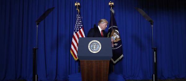 President Donald Trump walks from the podium after speaking at Mar-a-Lago in Palm Beach, Fla., Thursday, April 6, 2017, after the U.S. fired a barrage of cruise missiles into Syria Thursday night in retaliation for this week's gruesome chemical weapons attack against civilians. President Donald Trump walks from the podium after speaking at Mar-a-Lago in Palm Beach, Fla., Thursday, April 6, 2017, after the U.S. fired a barrage of cruise missiles into Syria Thursday night in retaliation for this week's gruesome chemical weapons attack against civilians. - Sputnik International