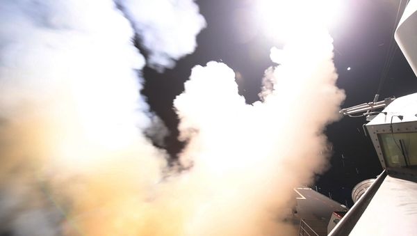 In this image provided by the U.S. Navy, the guided-missile destroyer USS Porter (DDG 78) launches a tomahawk land attack missile in the Mediterranean Sea, Friday, April 7, 2017. - Sputnik International